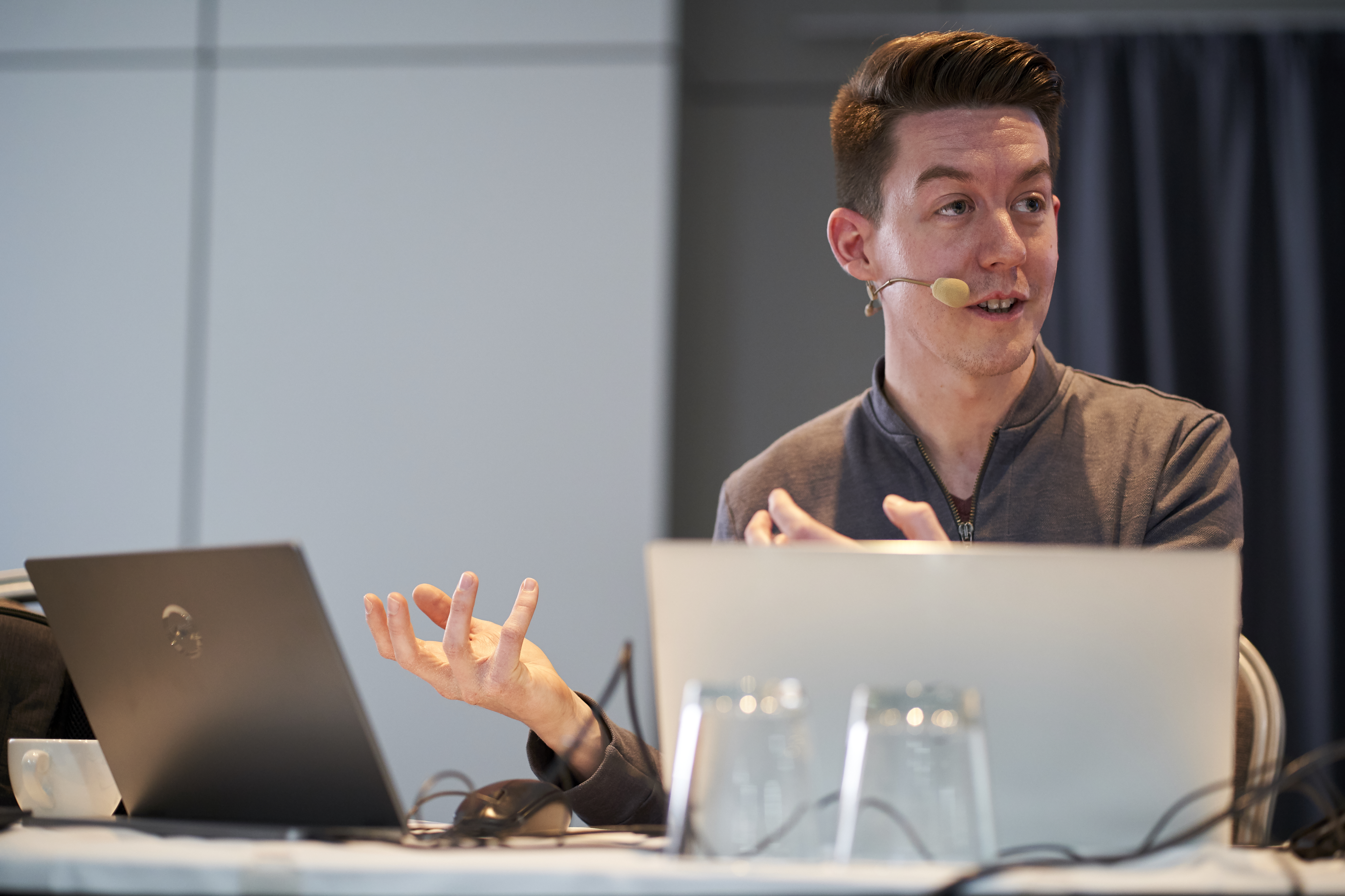 Fabian presenting and speaking during an Angular-focused session.